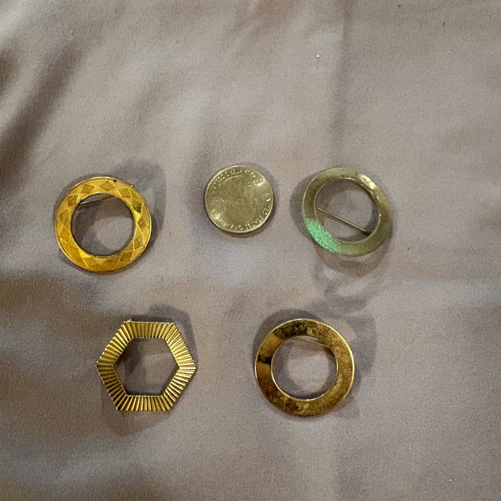 Gold colored vintage pins